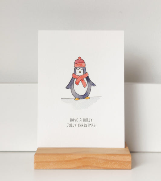 Kerstkaart pinguin muts en sjaal